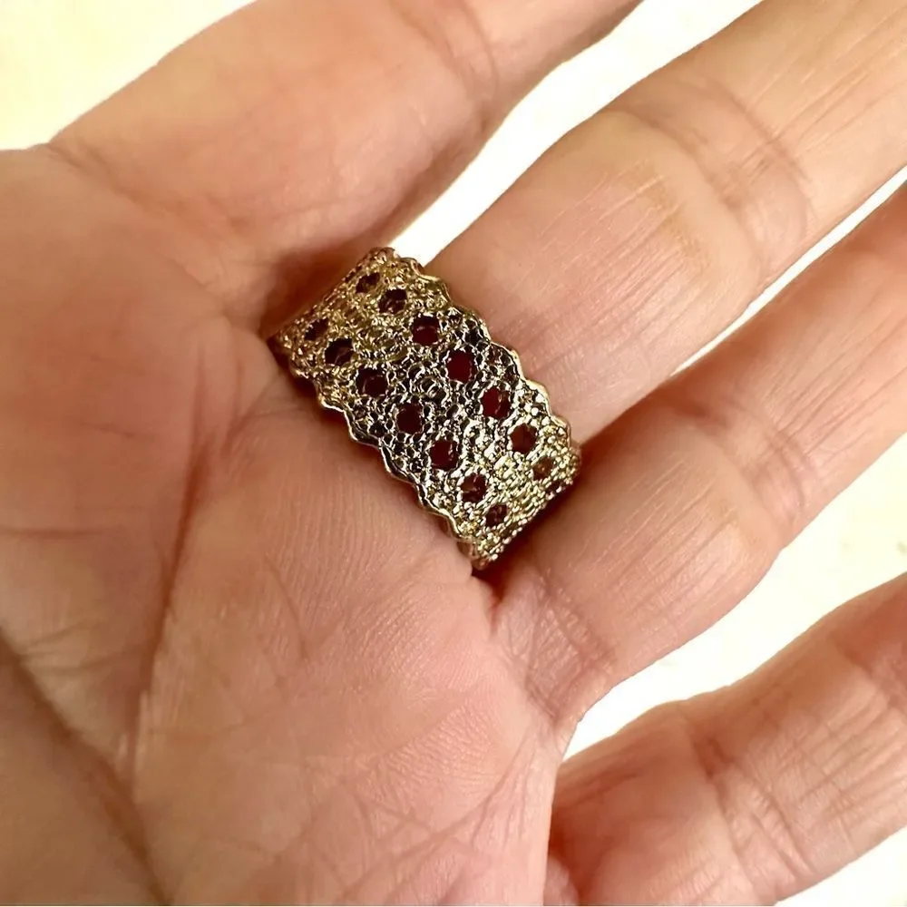 Gold tone band ring gold tone
